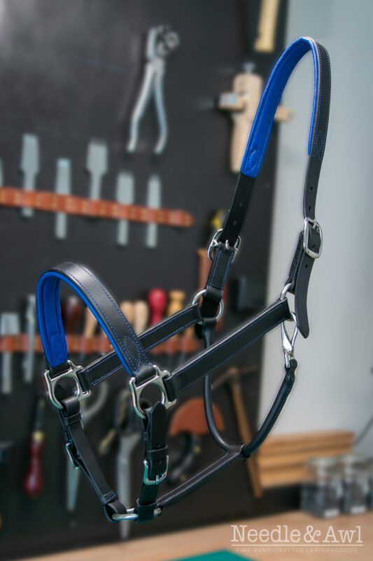 Handmade black leather halter with cobalt blue lining